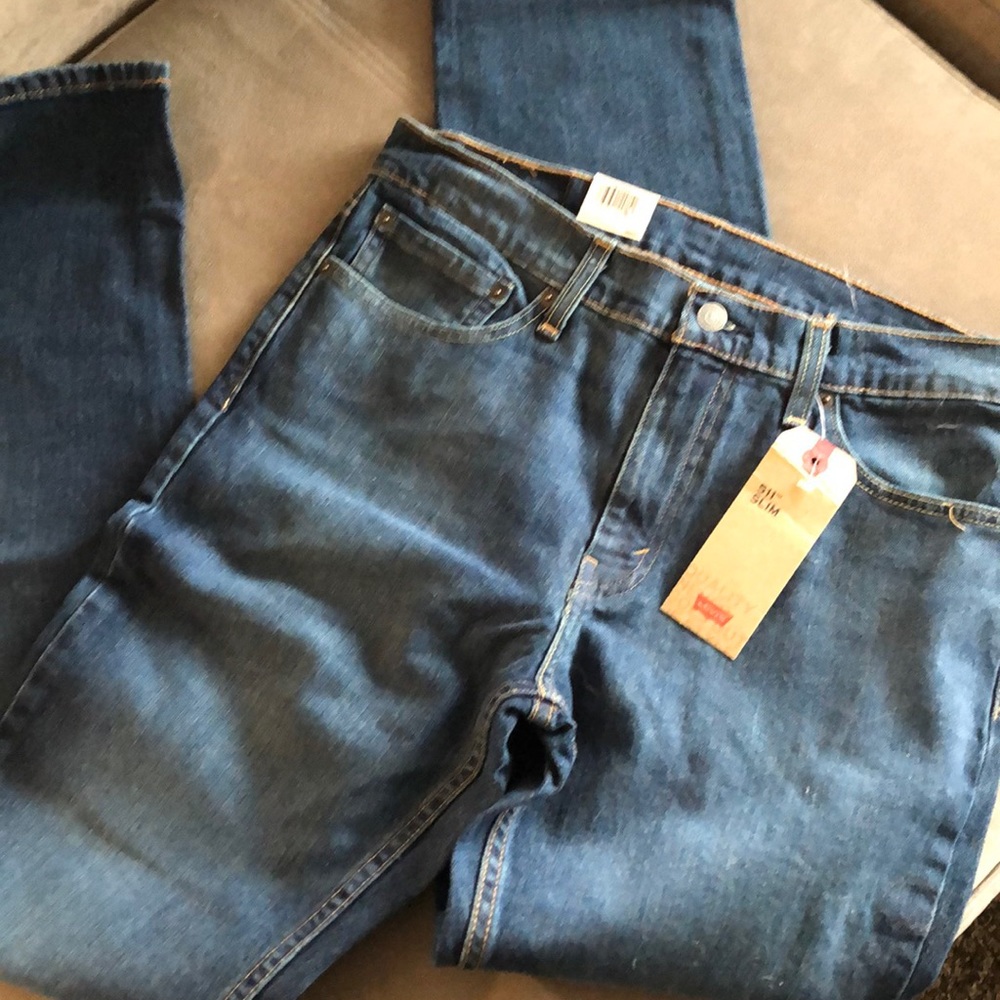 Men’s Levi’s denim jeans. Never worn, with tags.